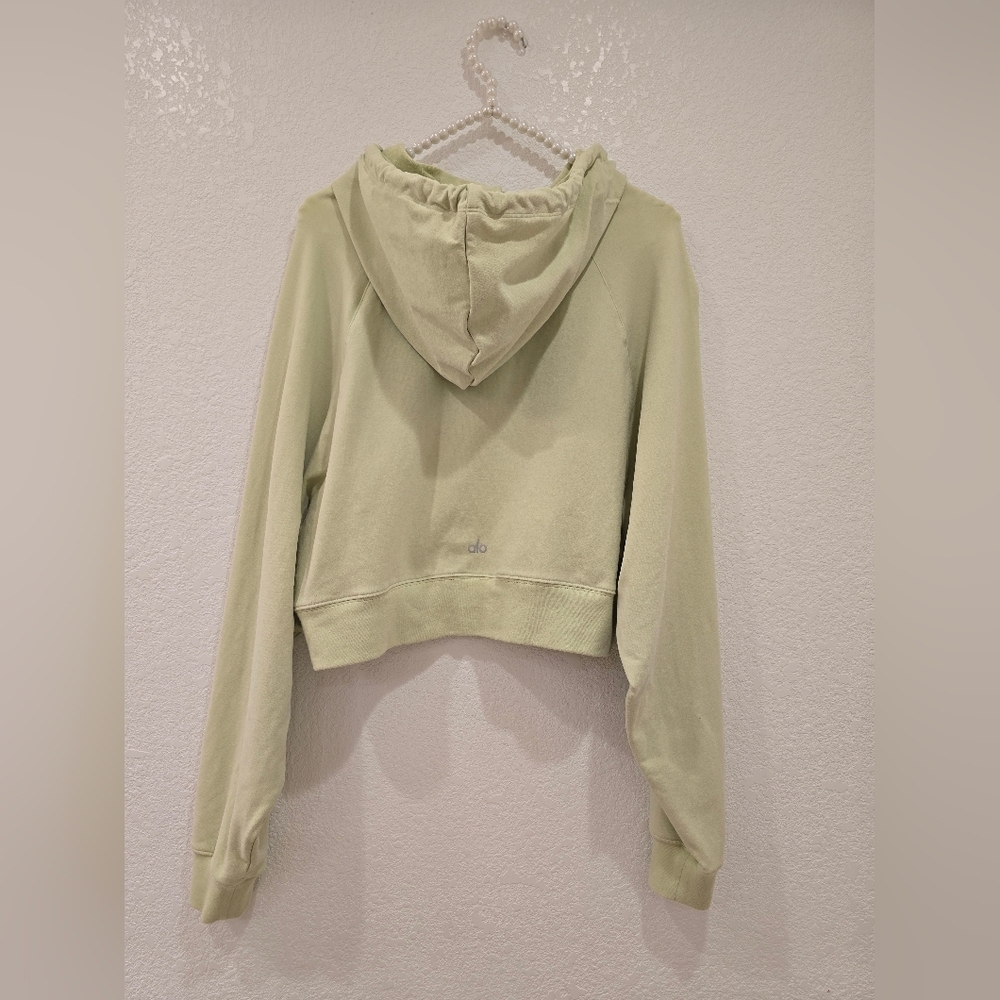 Alo Yoga Cropped Double Take French Terry Hoodie in the color Iced Green Tea - Picture 4 of 7